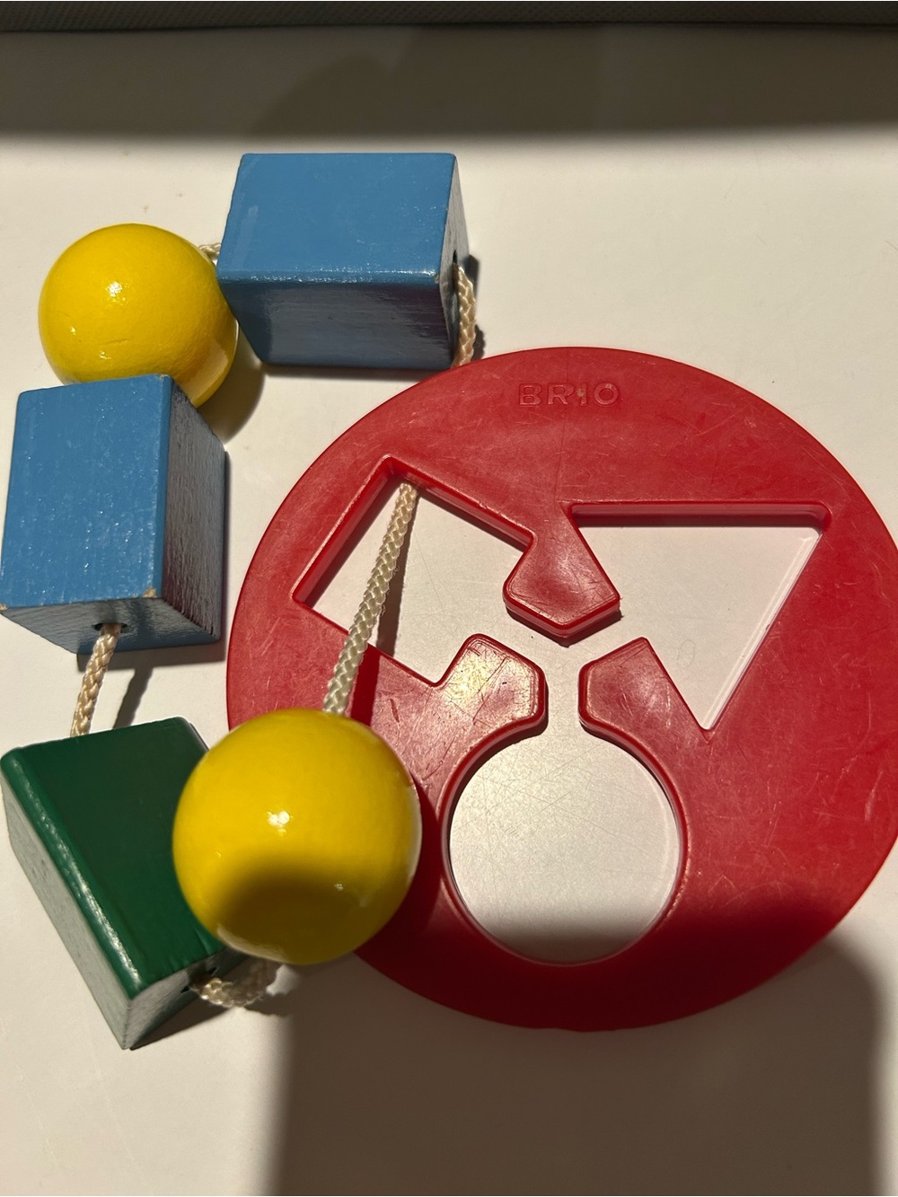 Brio Vintage Red Shape Sorter Necklace Toy with Yellow, Blue, Green Beads